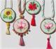 Embroidered cord and tassel jewelry